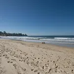 Oceanfront Views At Rolling Surf Resort