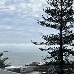 A Minutes Walk To The Beach!