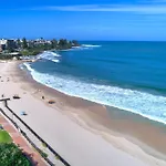 Absolute Beachfront Rolling Surf Resort