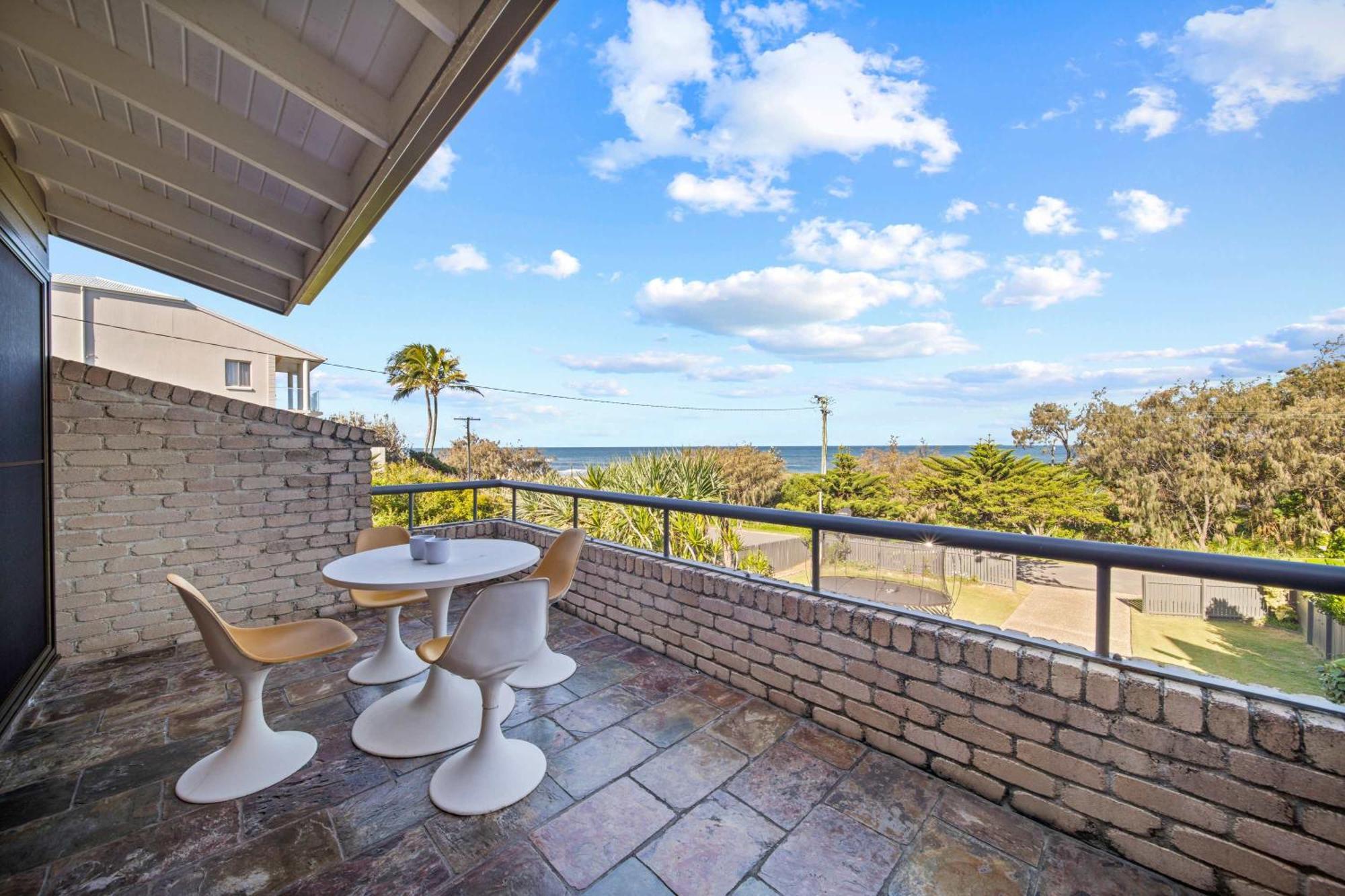 Retro House In Front Of Ocean *